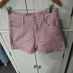 Short shorts with lots of pockets. Color is mauve